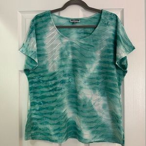 1X tie-dye tee in teal/turquoise/seafoam green with textured wave pattern
